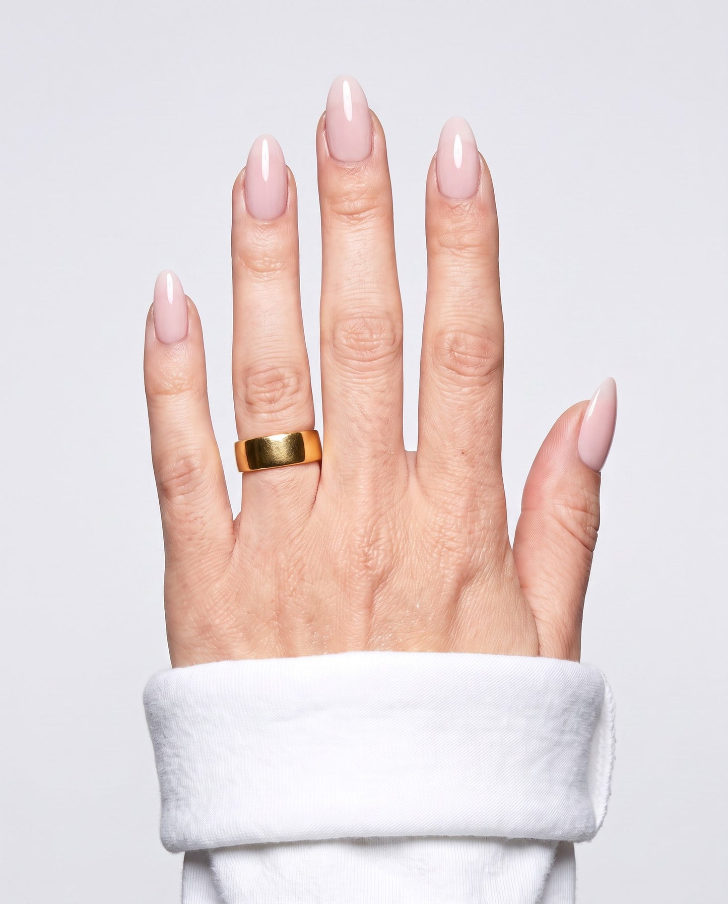ShimmeryGlo UV free gel nail wraps in Bare Silk, worn on hand