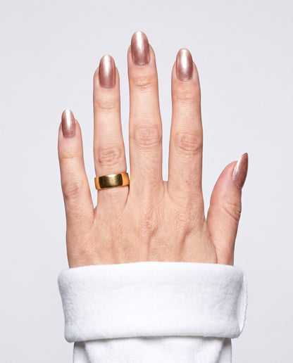 ShimmeryGlo UV free gel nail wraps in Gilded Rose, worn on hand