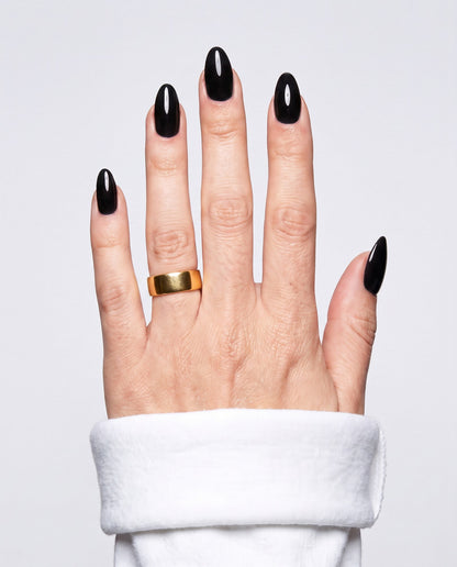 ShimmeryGlo UV free gel nail wraps in Liquid Noir, worn on hand