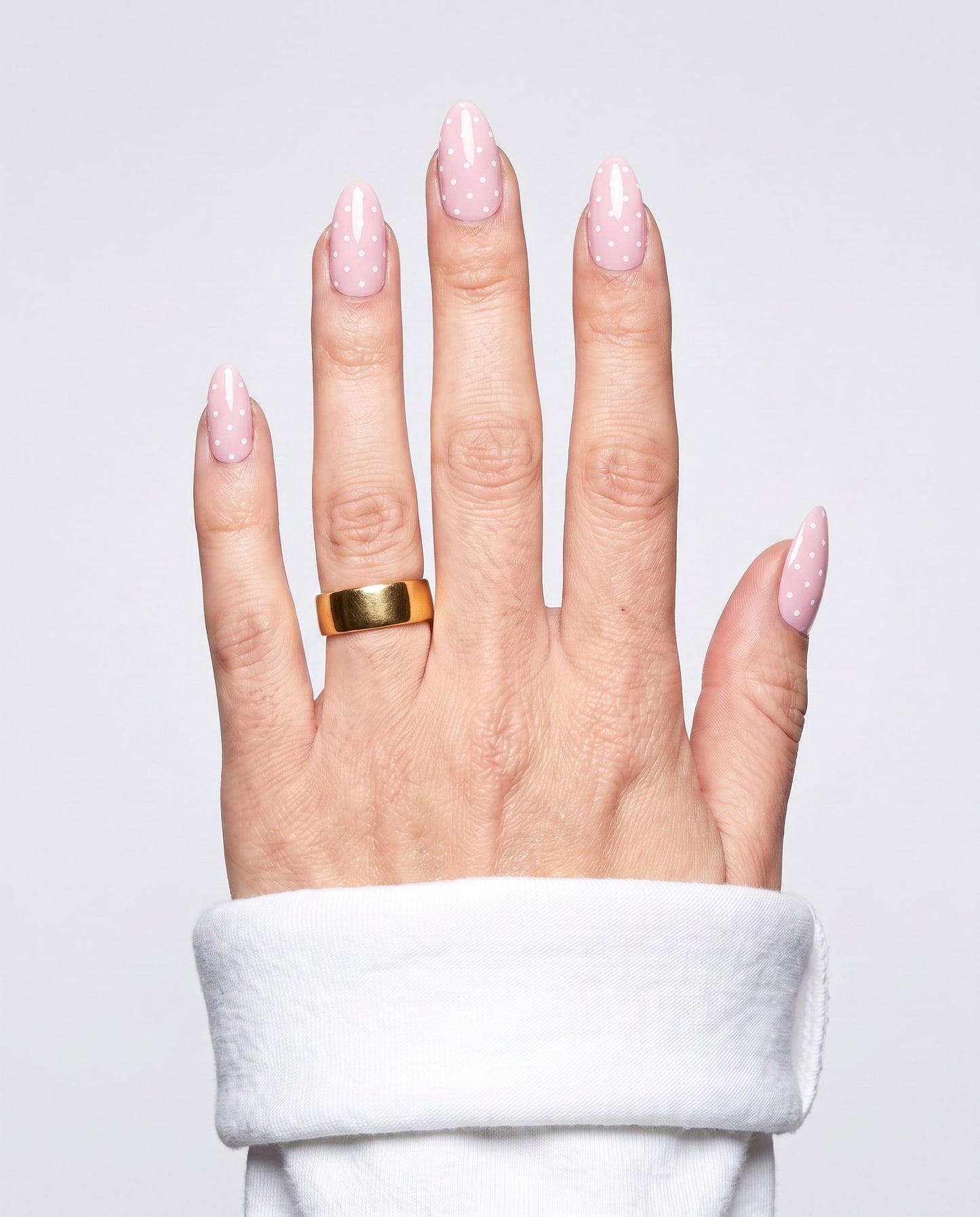 ShimmeryGlo UV free gel nail wraps in Powder Dot, worn on hand
