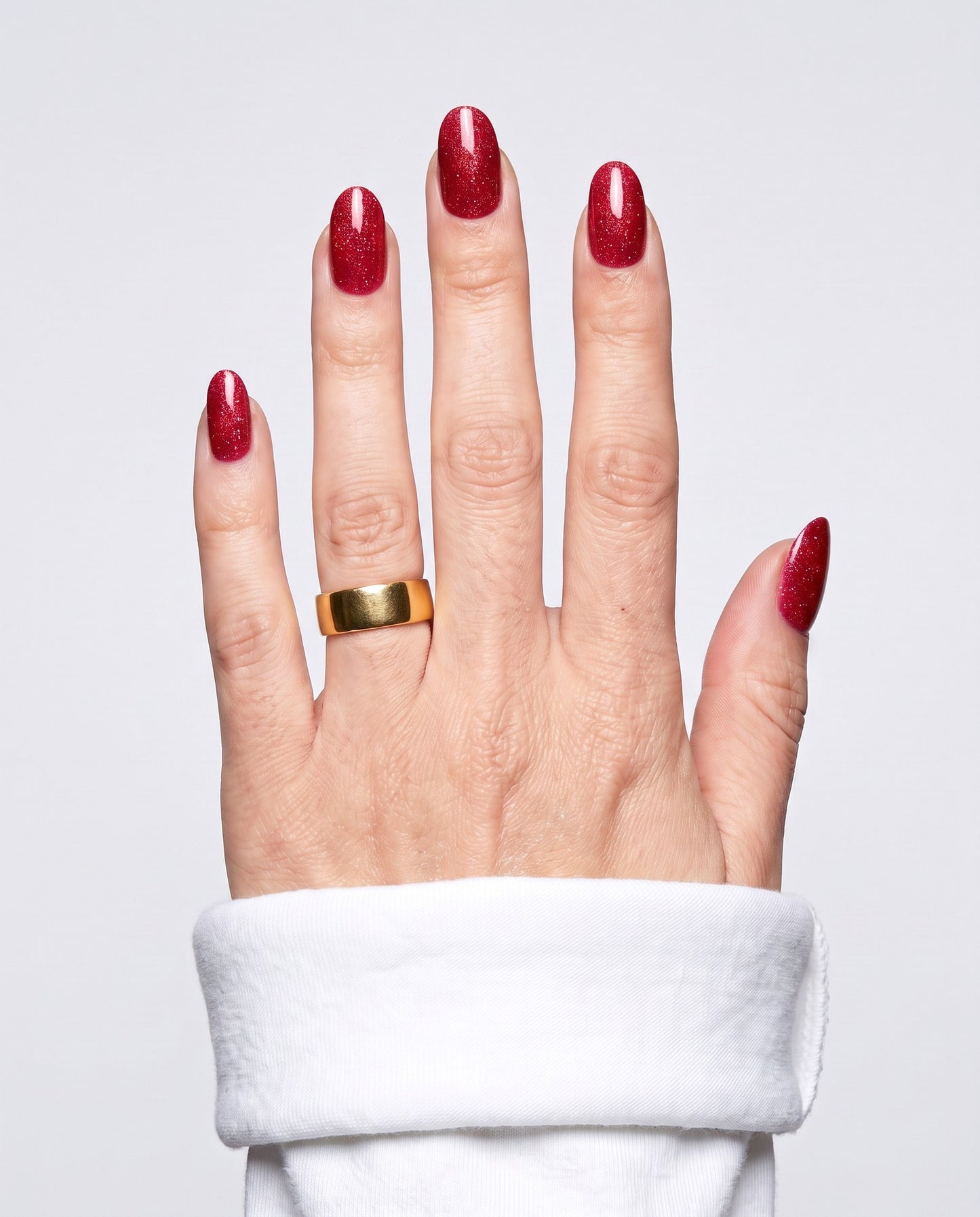 ShimmeryGlo UV free gel nail wraps in Sparkling Rosé, worn on hand